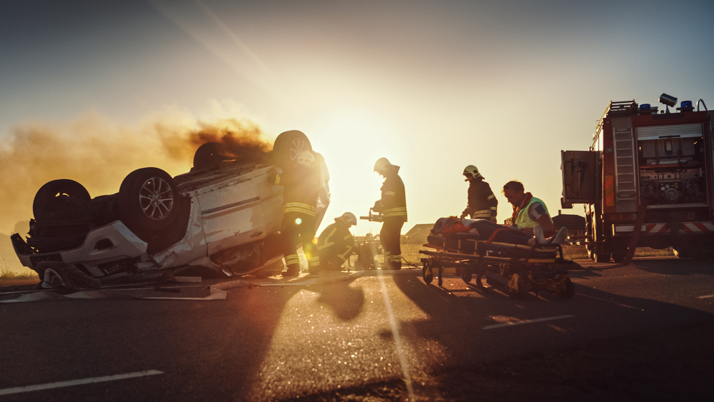 car flipped upside down and ambulance has to take away a victim in Mississippi to hospital